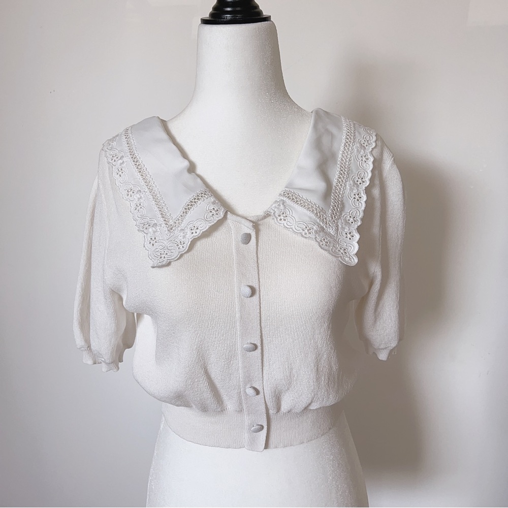 Beautiful Cute V-shaped lace neckline knitted top. Thin fabric, good for summer.